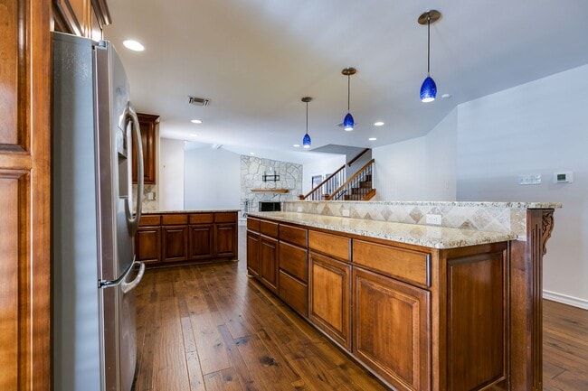 Building Photo - COMING APRIL 2026!!! Stunning Country Club Townhome!!