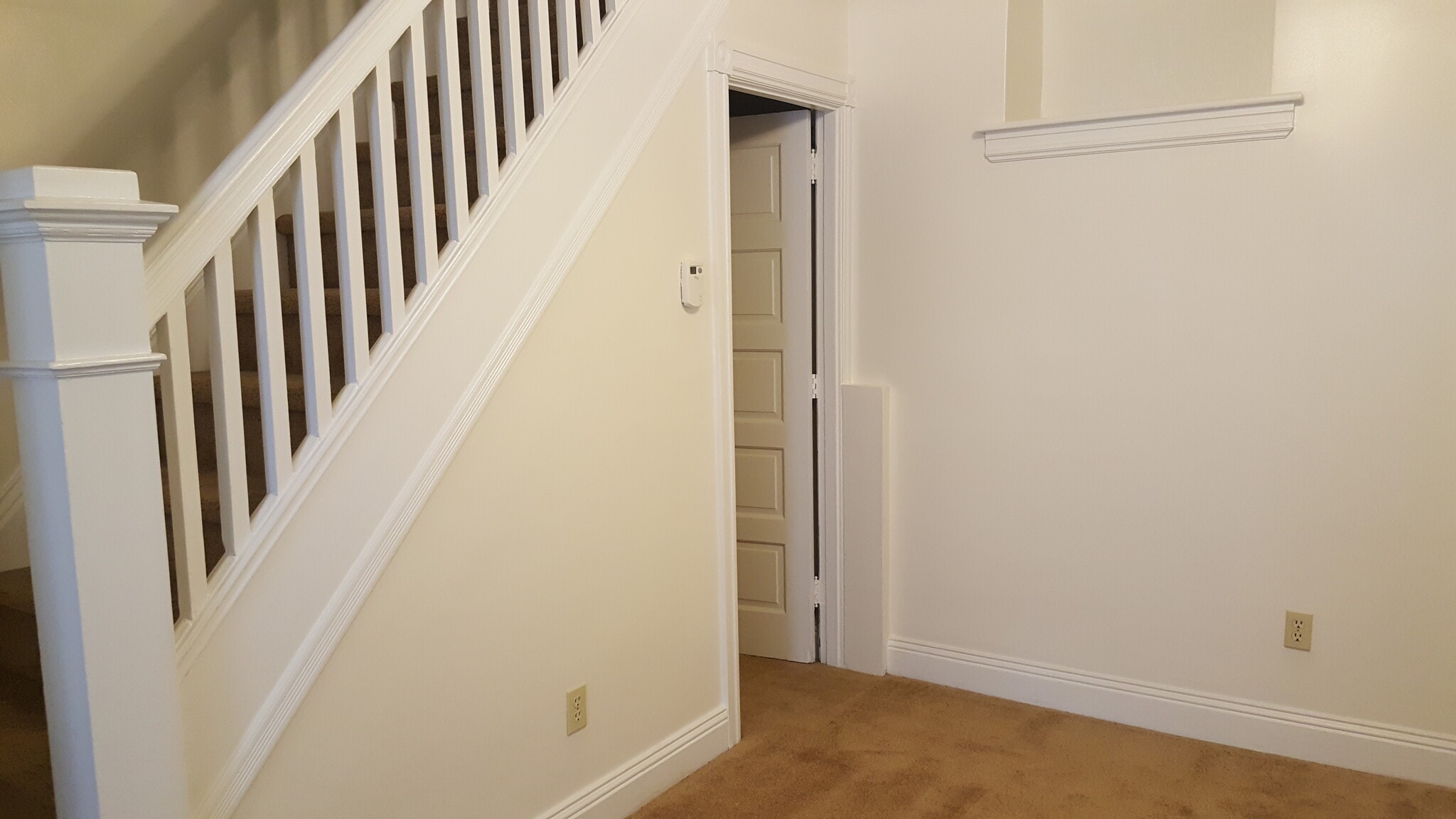 DINING ROOM AND ENTRANCE TO BASEMENT FOR WASHER DRYER - 526 Pearl St