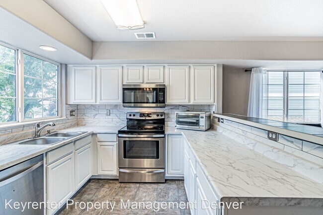 Building Photo - 2 br, 2.5 bath House - 8199 Welby Rd 4201