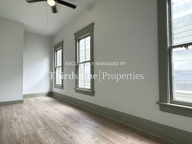 Building Photo - 210 E 9th St