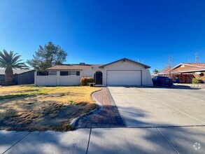 Building Photo - Single Story Home with Pool and Strip Views!