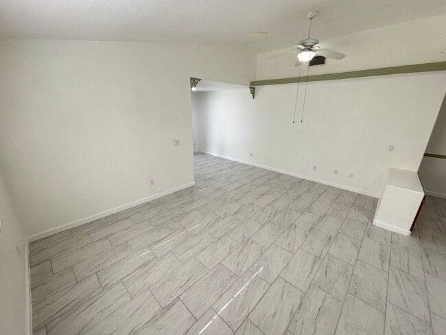 Building Photo - This inviting single-story home boasts a s...