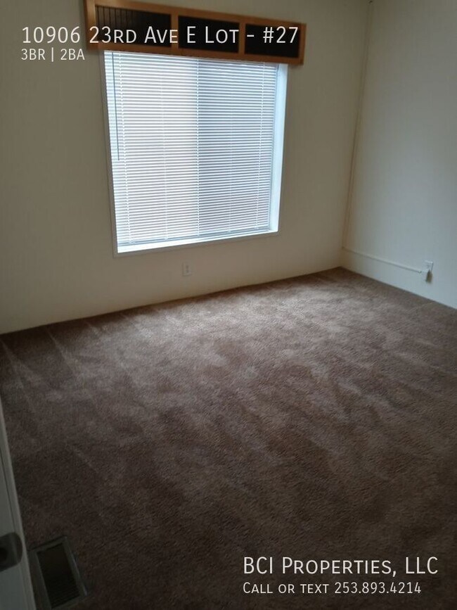 Building Photo - 10906 23rd Ave E