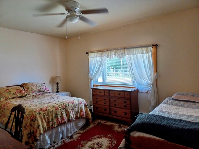 double bed with a twin in bright front room - 1034 County Route 48