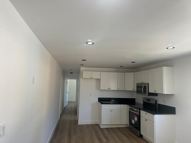 All new cabinets, new electric stove and microwave - 17834 La Salle Ave