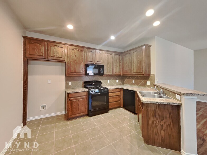 Building Photo - 4909 Six Gun Ln