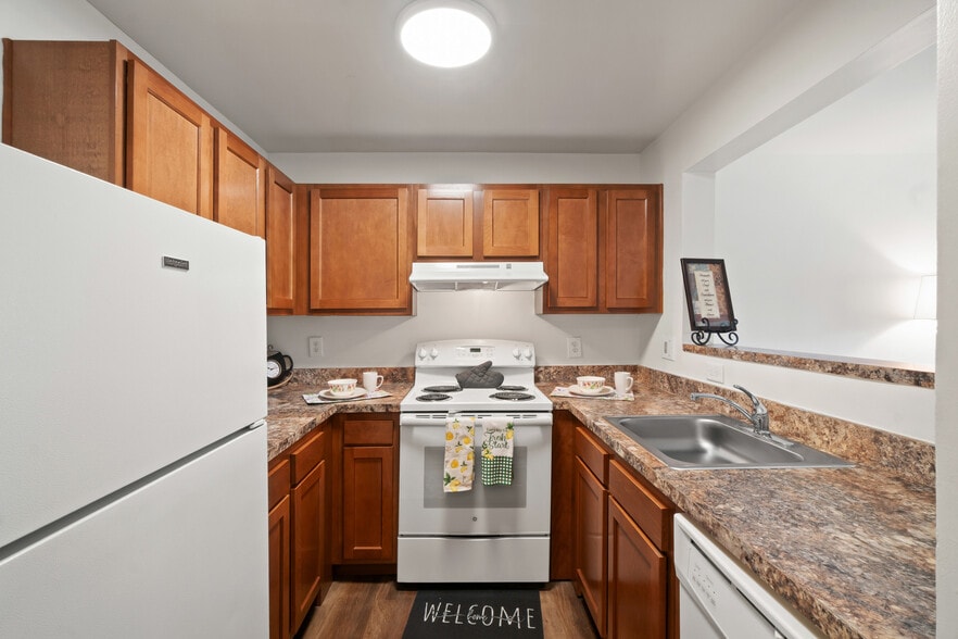 Building Photo - Woodside Village 55+ Apartments