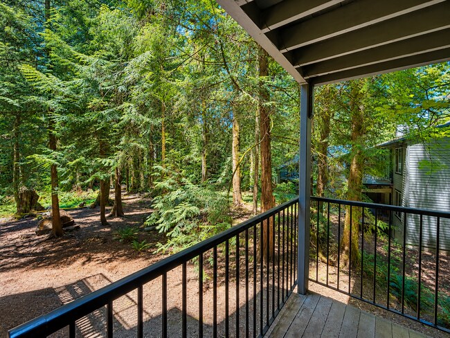 Building Photo - Modern Wooded Condo with Upgraded Kitchen & Private Deck