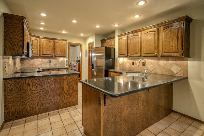 Building Photo - Breathtaking Three Bedroom Townhouse In The Pinery On The Golf Course