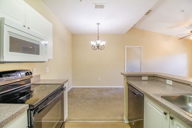 Building Photo - MOVE IN BY MAY 15th and GET 2 WEEKS OFF YO...