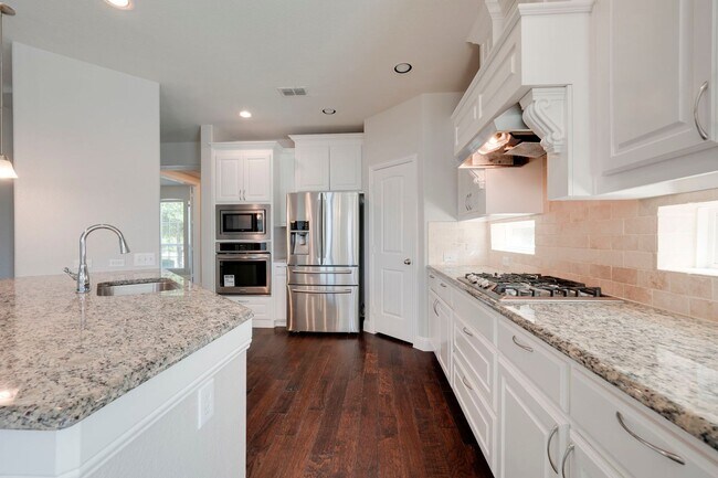Building Photo - Welcome to this beautiful 4-bedroom, 3.5-b...