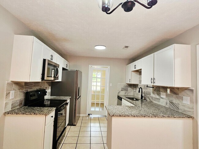 Building Photo - 7490 Beverly Dr