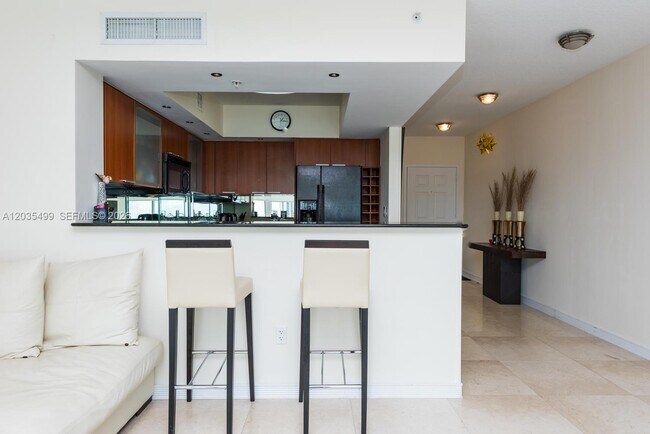 Building Photo - 16699 Collins Ave