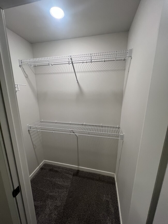 Upstairs bedroom closet - 772 River Bend Ln