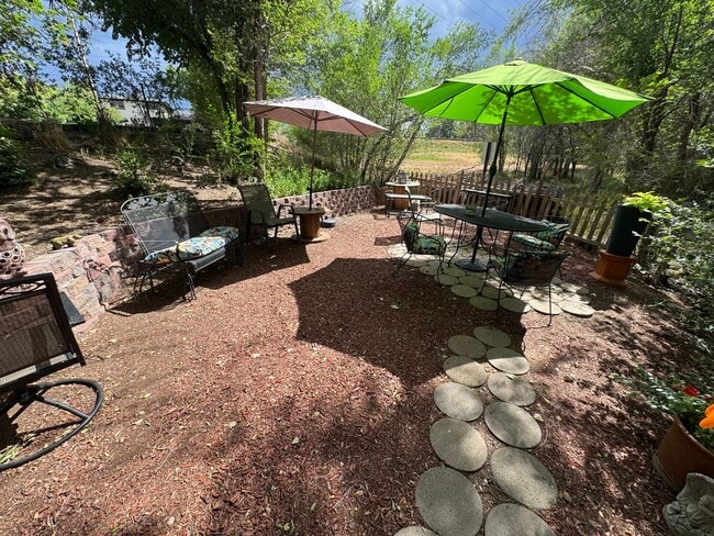 Building Photo - Bright 2BR Townhome with 3 Balconies & Private Patio