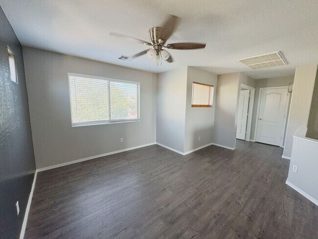 Building Photo - 4BR / 2.5BA Home with Expansive Lot – 2-Car Garage, Community Pools & Golf