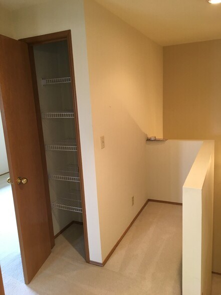 Linen closet & open space, outside 2nd BR at top of stairs - 610 Glen St