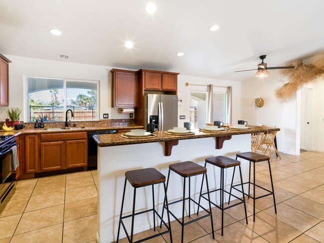 Building Photo - Spacious 4 Bedroom 2 Bathroom Home With A Pool