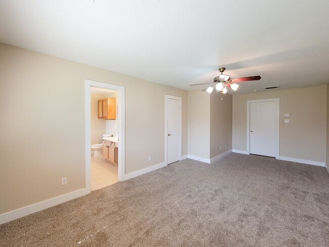 Building Photo - 3 bedroom one story home on large corner lot. Home has hard flooring throughout living areas and ...