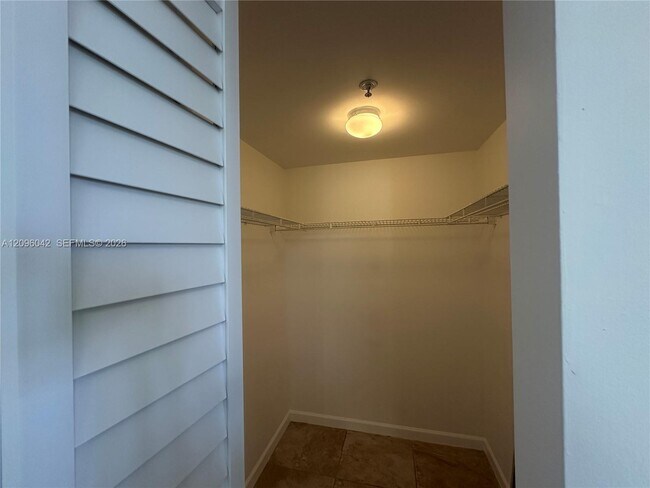 Building Photo - 3241 Sabal Palm Manor