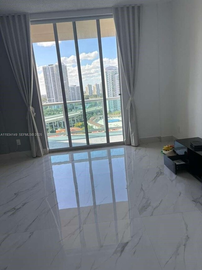 Building Photo - 19390 Collins Ave