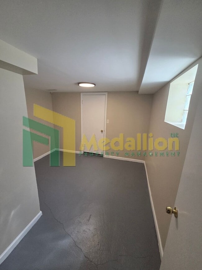 Building Photo - Spacious 4-Bedroom Home with Finished Basement and Yard Space