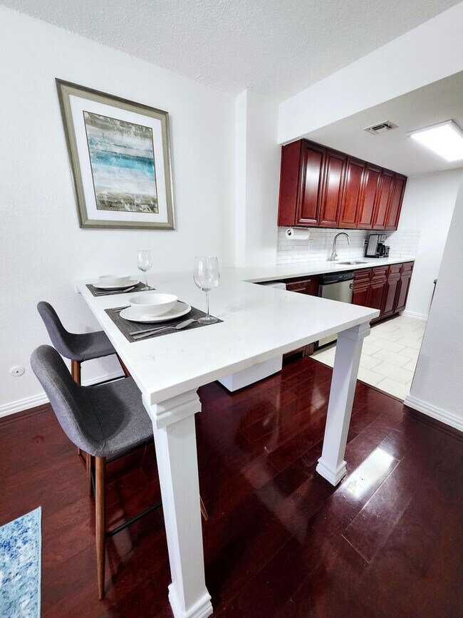 Building Photo - Modern Downtown Living with Comfort, Security & Style