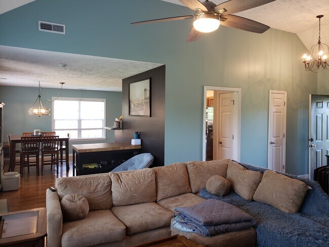 Large living and dining area with room for large table and kitchen pass through. - 820 Laramie Ct