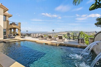 Building Photo - Luxurious Pool Home with Views in Gated Be...