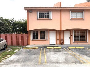 Building Photo - 9837 W Okeechobee Rd