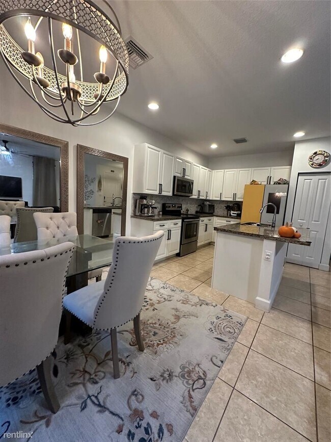 Building Photo - 4 br, 3 bath House - 4879 NW 55th Pl