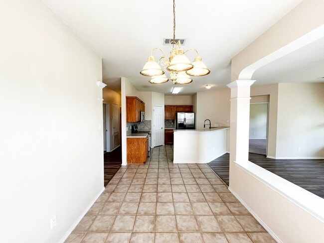 Building Photo - Available Now Beautiful 1 story, 4 bedroom, 2 bath, 2 car garage home with fire place, garage doo...