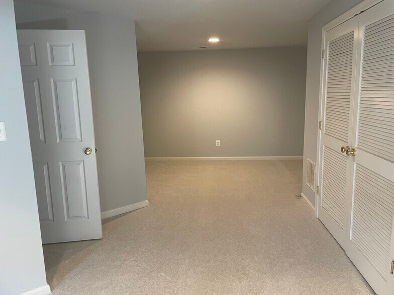 Bedroom Area (Studio Style next to Living Room) - 9028 Woodpecker Ct