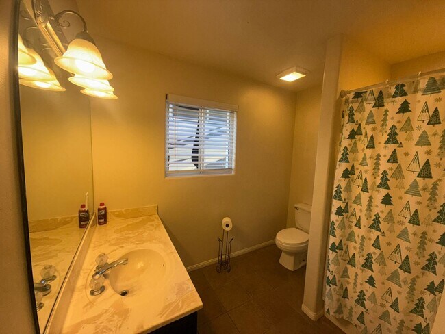 Building Photo - 4BR/2BA HOME w/ attached garage, usable land, fenced in back yard in CAMPO available!