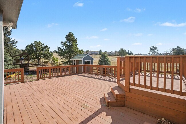 Building Photo - Backs to Open Space | Over 4,000 Sq Ft | Updated Kitchen + Solar