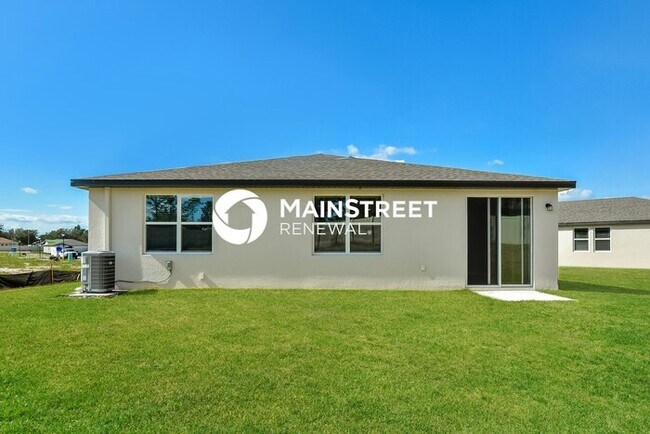 Building Photo - 4 Bedroom Pet-Friendly Home in Auburndale, FL with Main Street Renewal