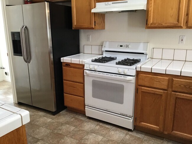 Building Photo - Three bedroom in gated community.