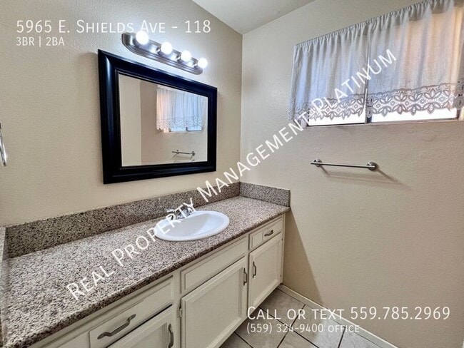 Building Photo - 5965 E Shields Ave