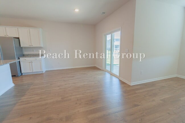 Building Photo - Spacious 4 Bedroom with Pond View