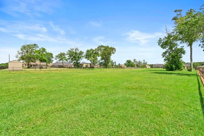 Building Photo - 9502 Windsong Dr