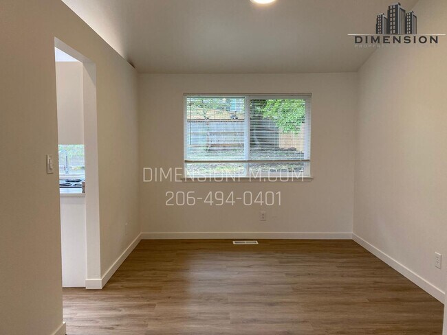 Building Photo - Stylishly Renovated Home with Private Back...