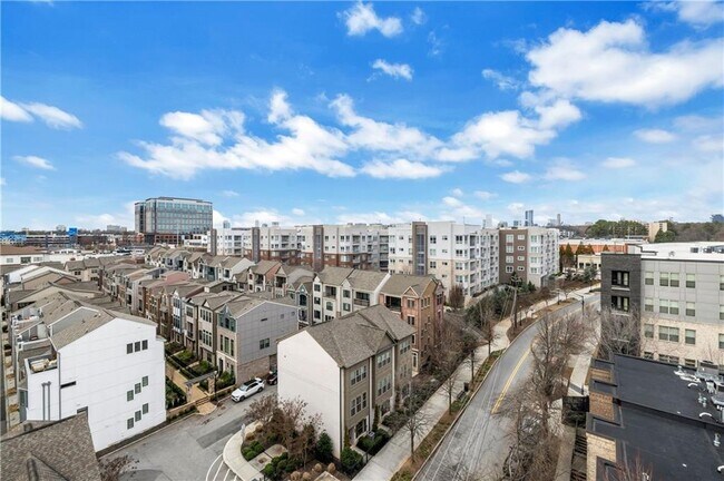 Building Photo - 711 Cosmopolitan Dr NE