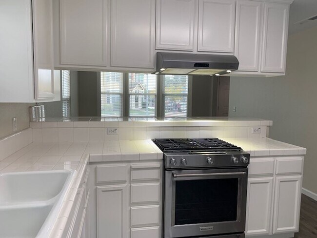 Building Photo - ~4 Bedroom 2.5 Bath House ~ Includes Water & has Solar ~ Huge Savings on Utilities ~