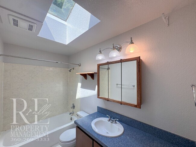 Building Photo - Freshly Painted East Bremerton Home with Expansive Decks & Flexible Living Space