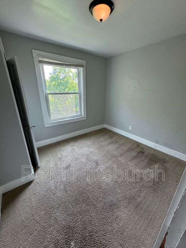 Building Photo - 311-313 W Burgess St