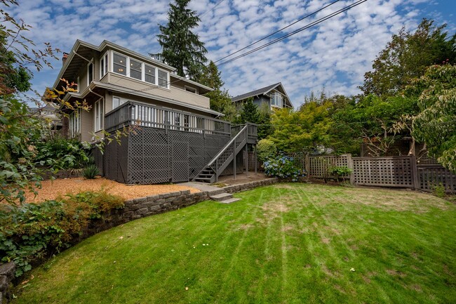 Building Photo - Traditional Four-Corner Craftsman Home on ...