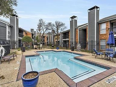 Building Photo - Charming 1-Bedroom Condo in Gated North Da...