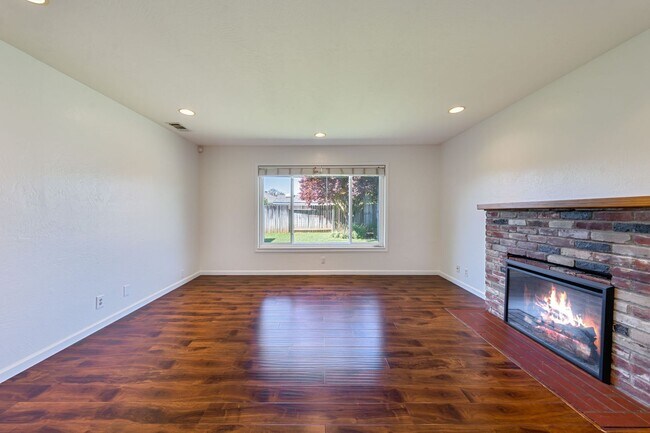 Building Photo - 3BR + Office Home in Excellent Condition with Storage Sheds and Garage Workspace!