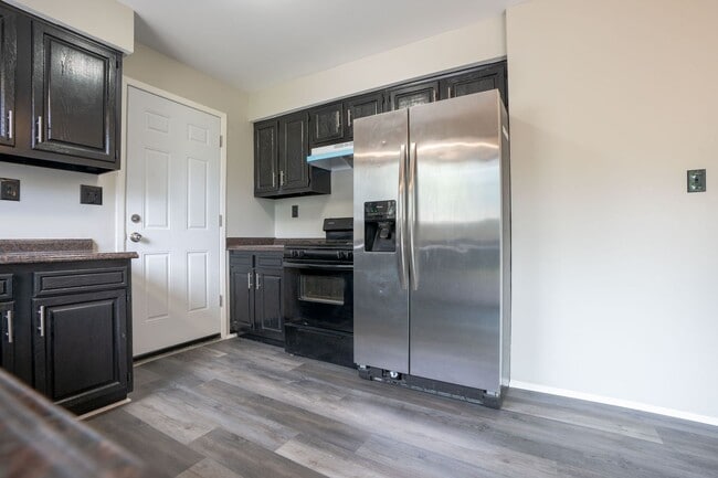 Building Photo - Must see FOUR bedroom Trilevel home