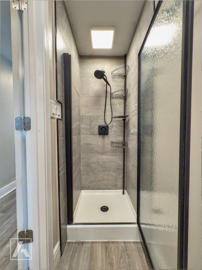Building Photo - Stylish Renovated Studio – All Utilities I...